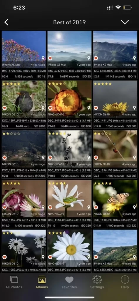 EXIF Viewer in dark mode showing the Best of 2019 album as a grid, each photo labelled with its camera, file size, aperture, shutter speed, ISO and star rating