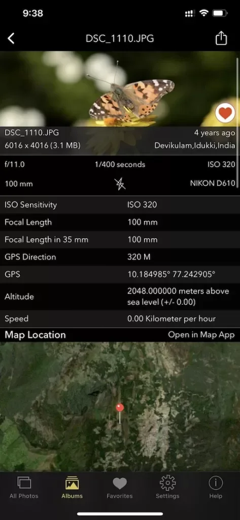 EXIF Viewer in dark mode showing a photo's GPS coordinates, altitude and direction with the location on a map